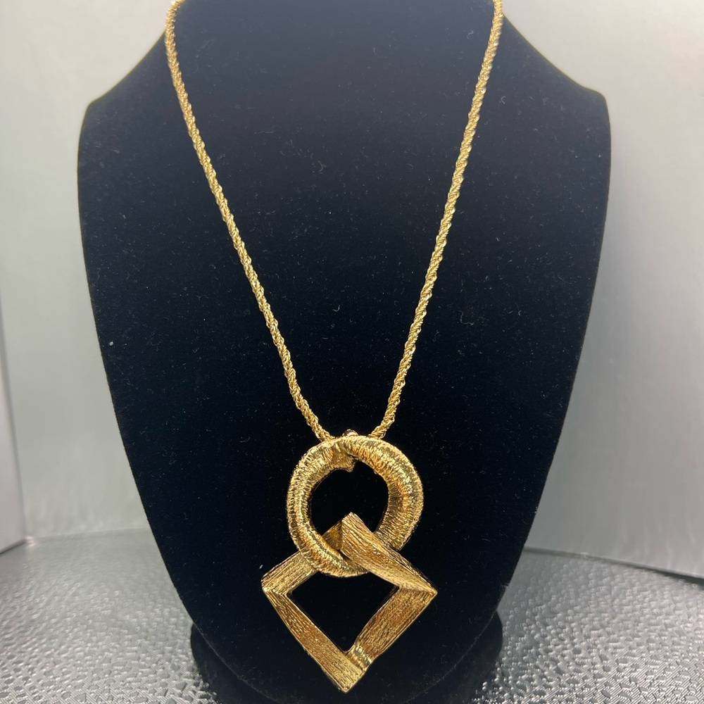 Yves Saint Laurent Pendant and Gold Chain